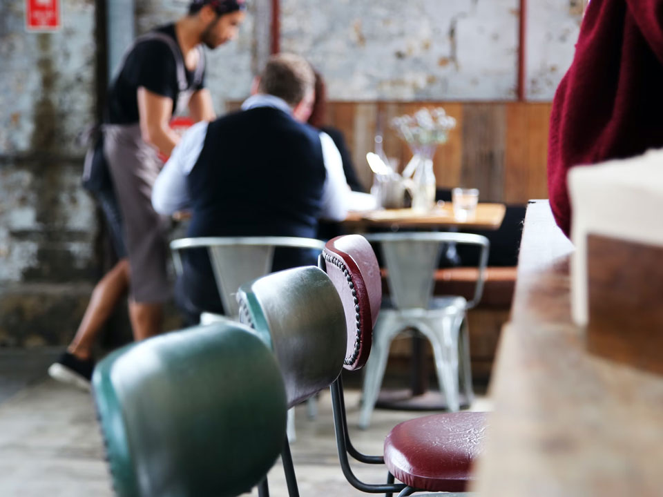 a group of people sitting at a table